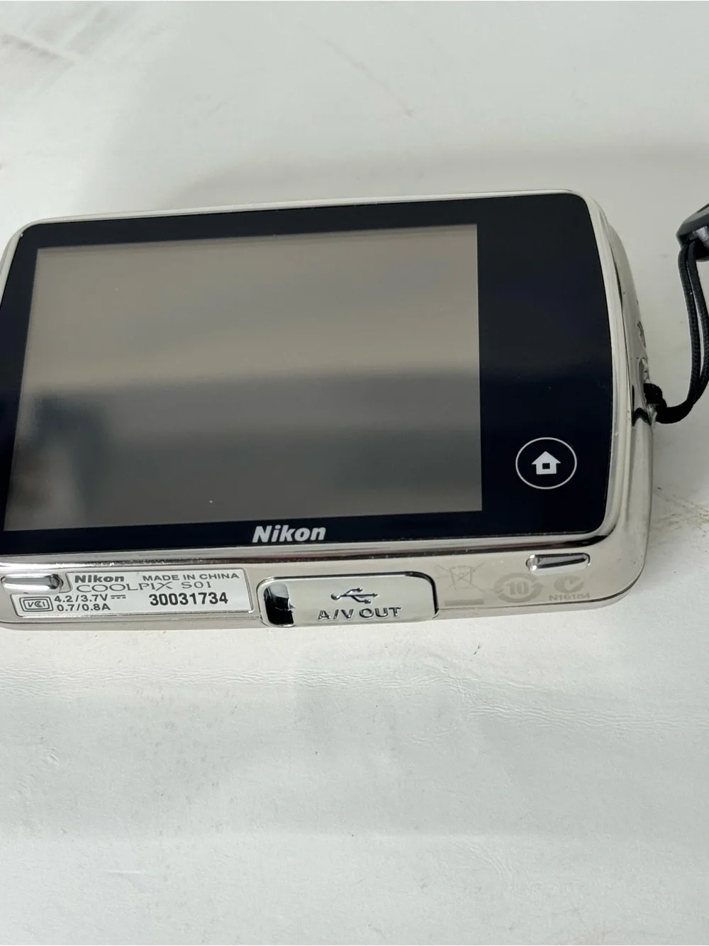 Nikon COOLPIX Silver Point-and-Shoot Camera with Black Case with charger cable
